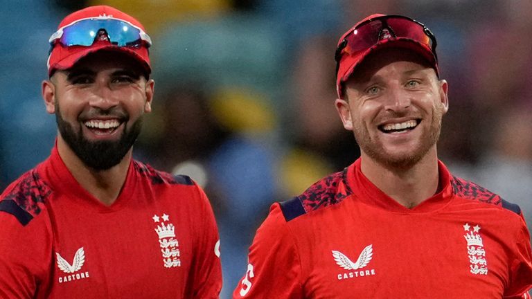 England's captain Jos Buttler (right) in T20 cricket (Associated Press)